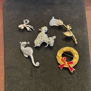 Elegant Silver and Gold Brooch Set